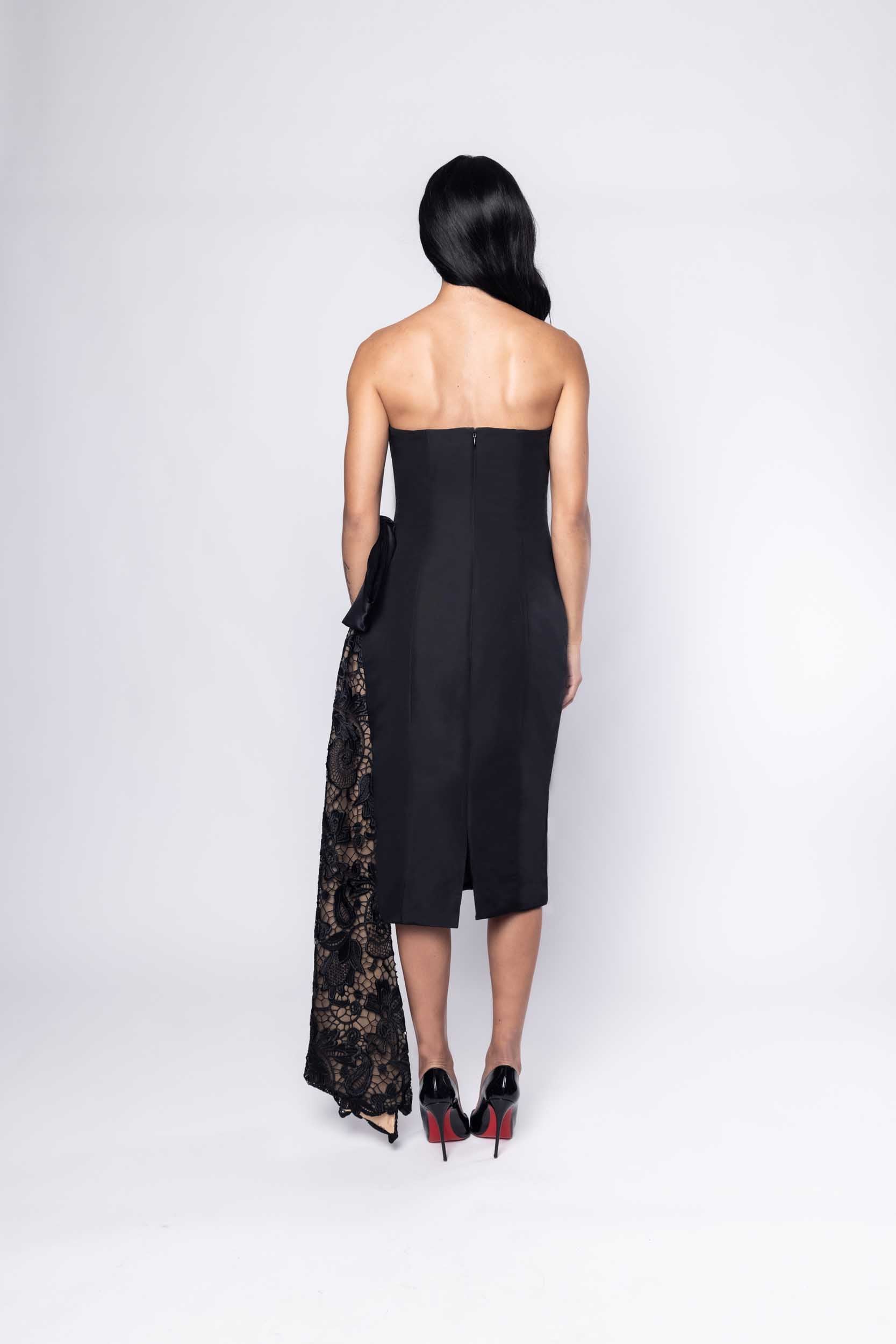 Gorgeous model in chic black embellished Sujata Gazder cocktail dress - back view