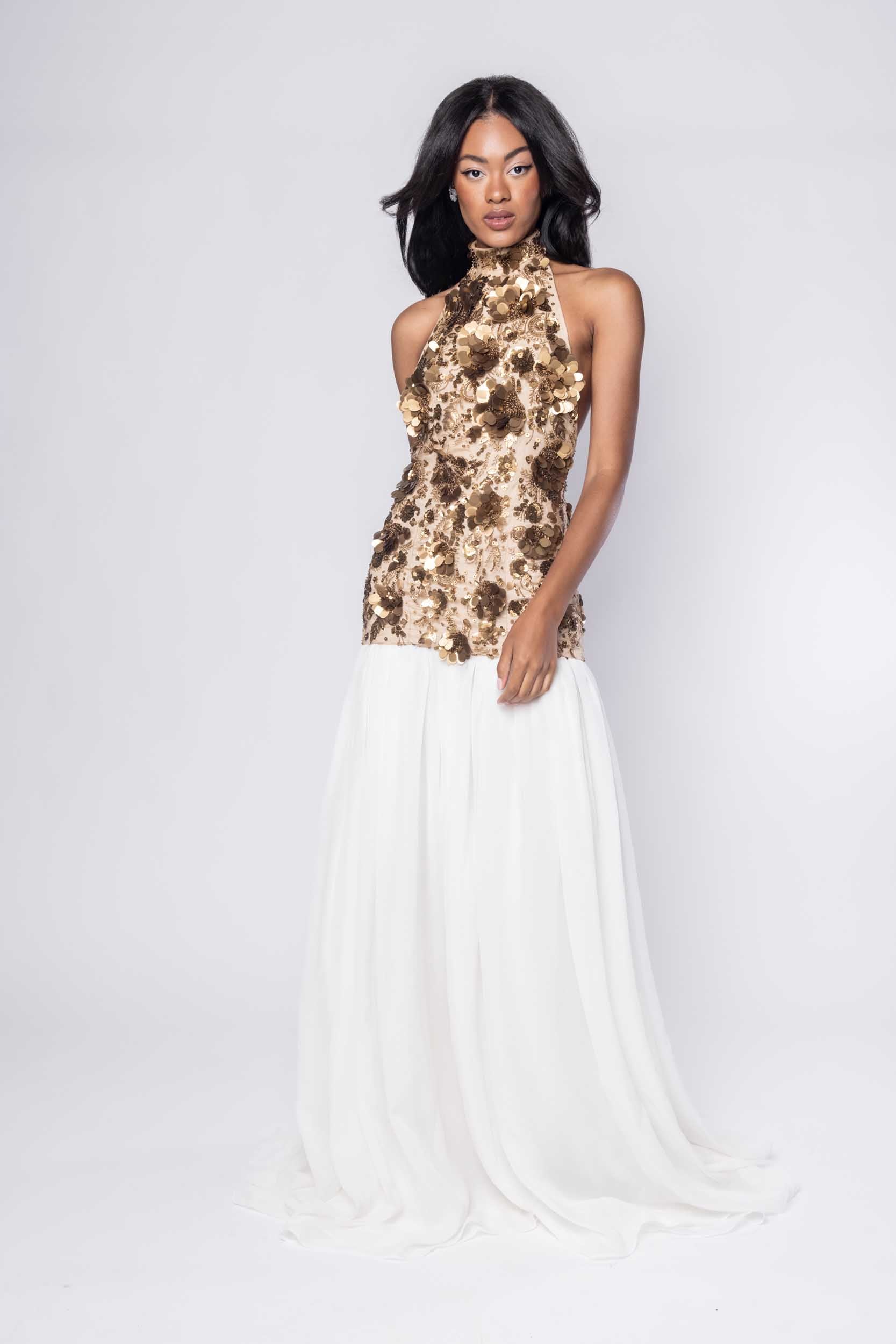 Beautiful model in a sequined and white Sujata Gazder gown - front view