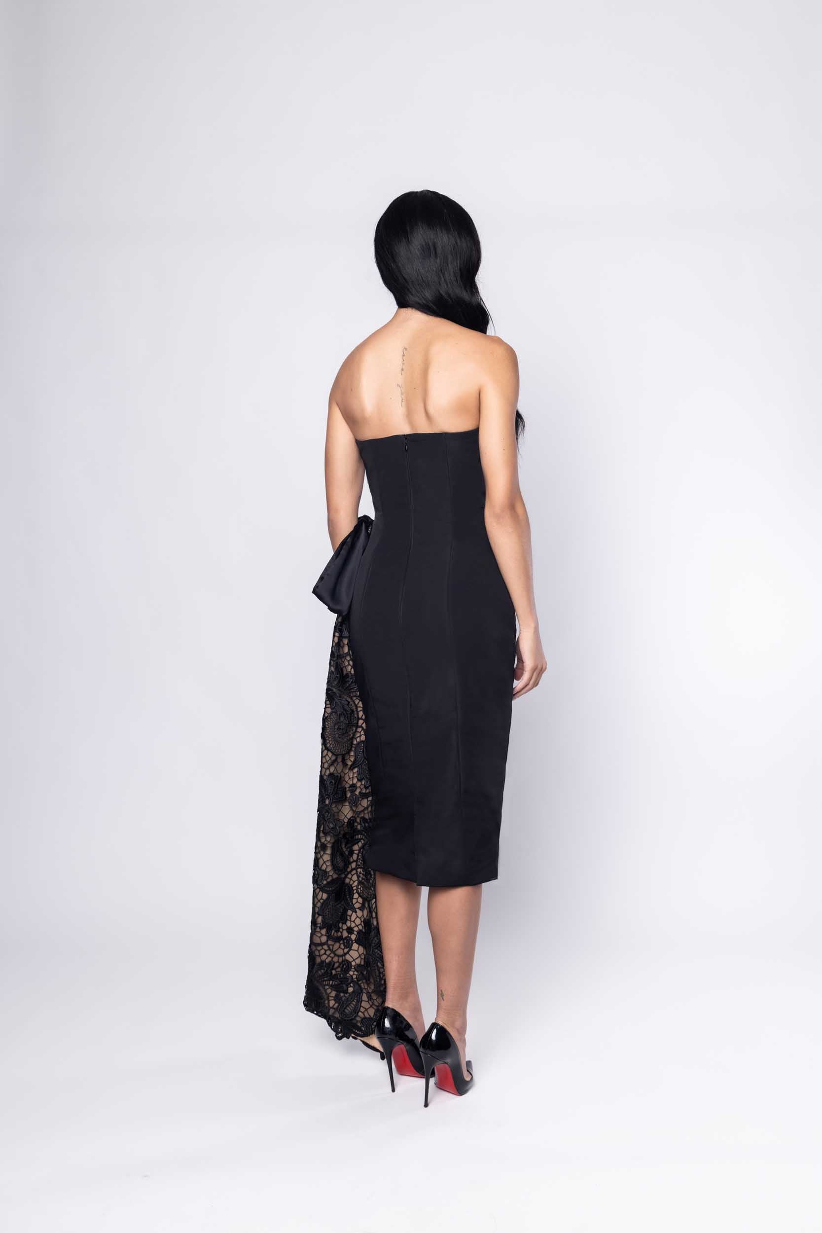 Gorgeous model in chic black embellished Sujata Gazder cocktail dress - back view