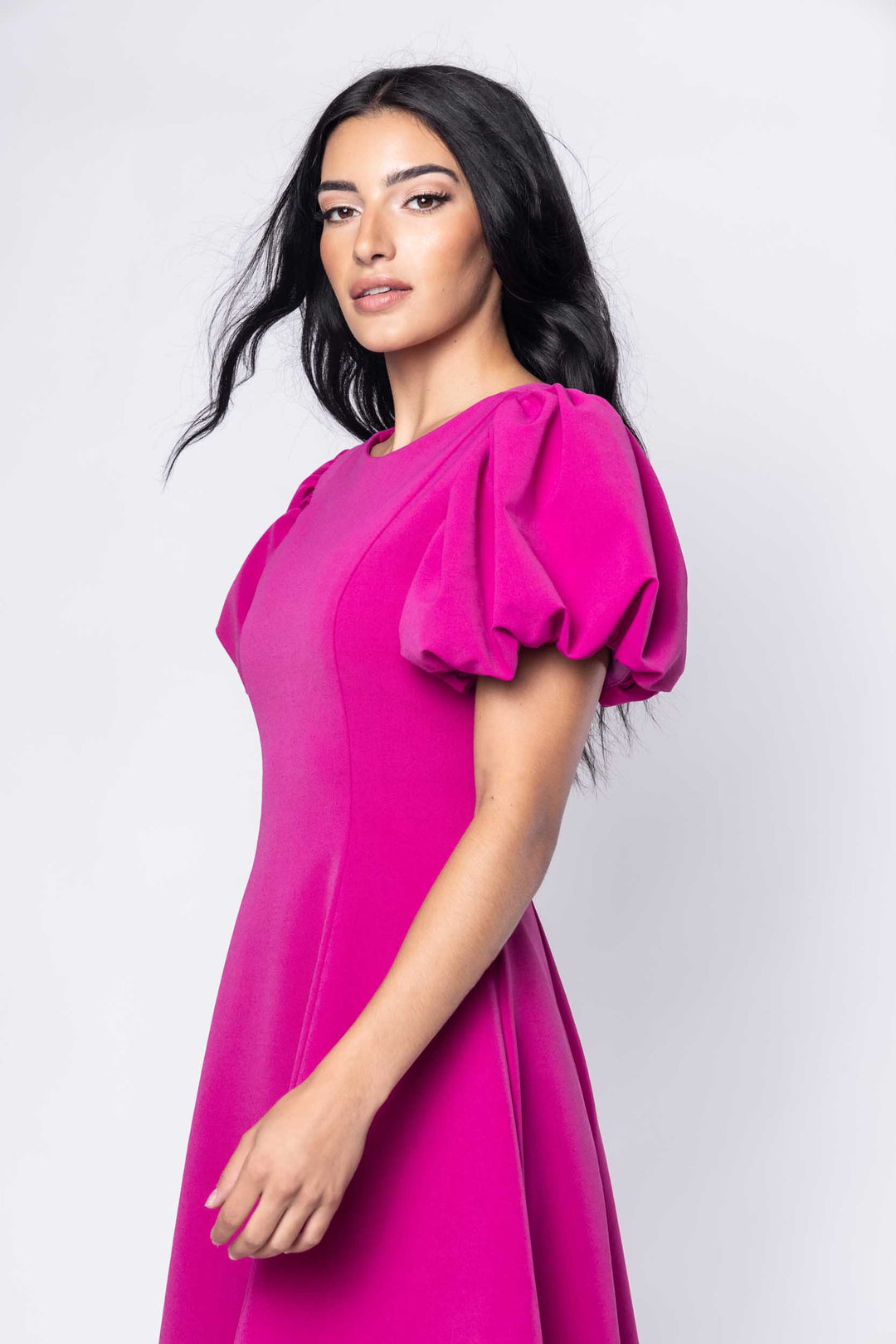 Beautiful model in fuchsia cocktail silk Sujata Gazder dress - close view