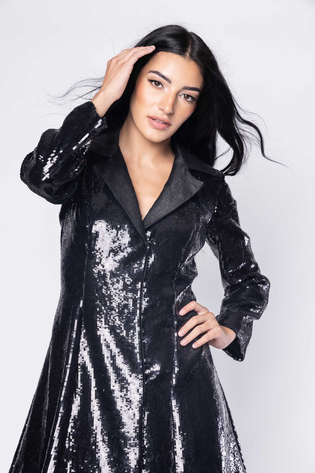 Beautiful model in an sequined, ornate Sujata Gazder jacket cocktail dress - close view
