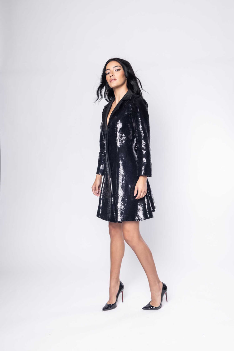 Beautiful model in an sequined, ornate Sujata Gazder jacket cocktail dress - side view