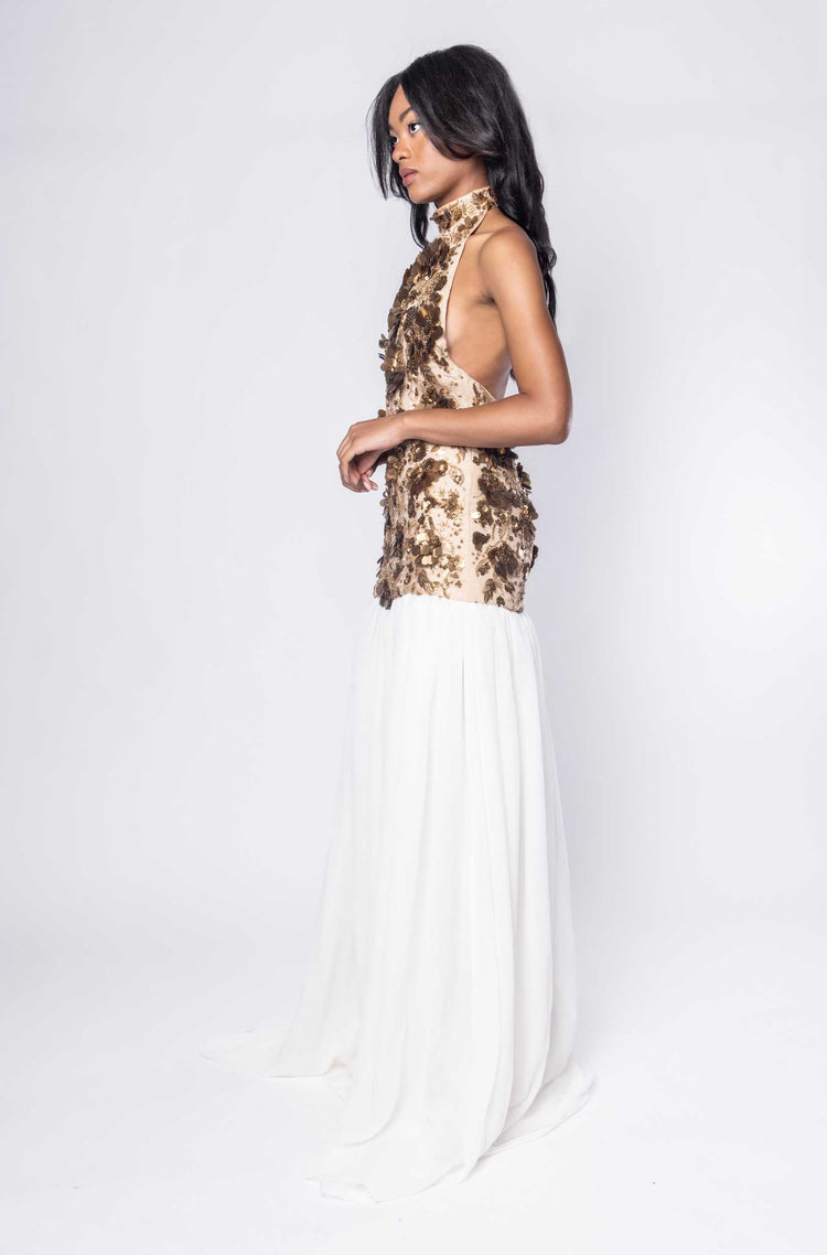 Beautiful model in a sequined and white Sujata Gazder gown - side view