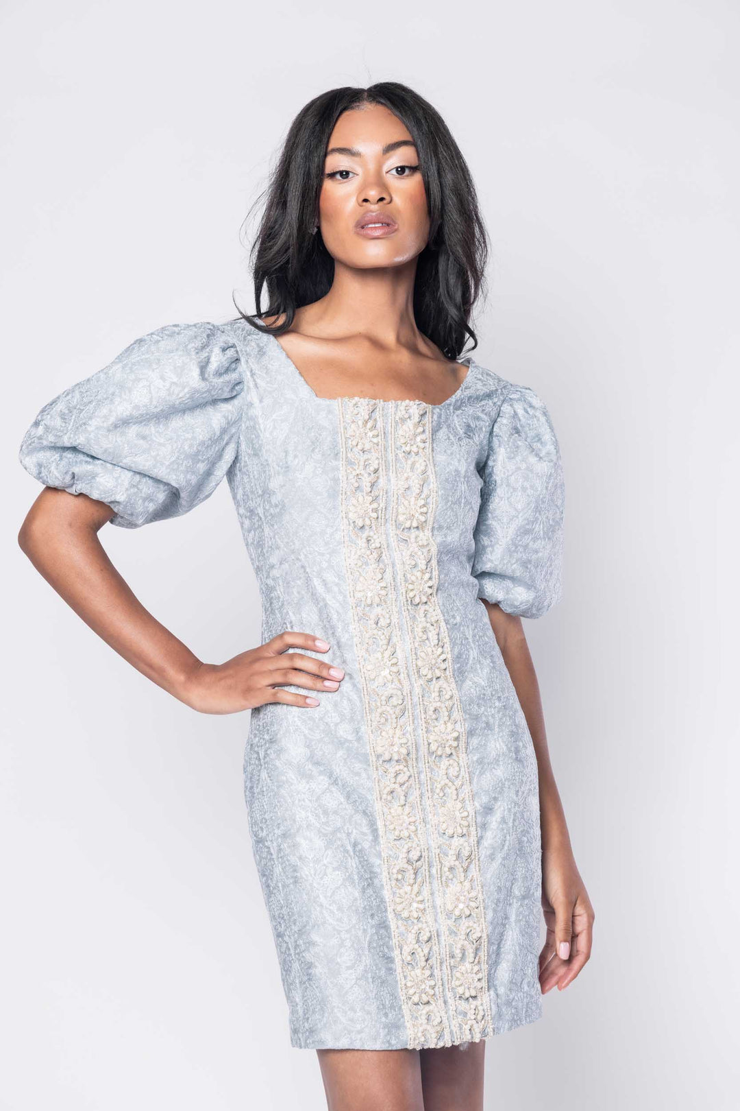 Beautiful model in a pale blue beaded ornate cocktail dress by Sujata Gazder - close view