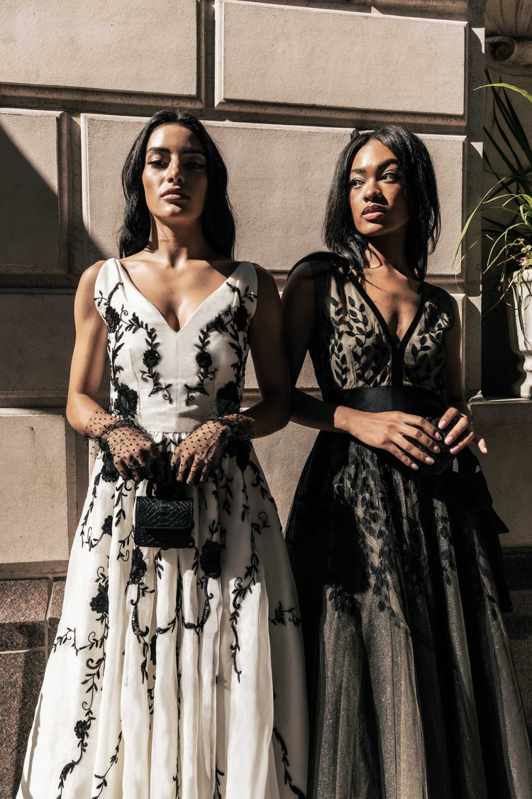 Two models in the street in gorgeous Sujata Gazder gowns