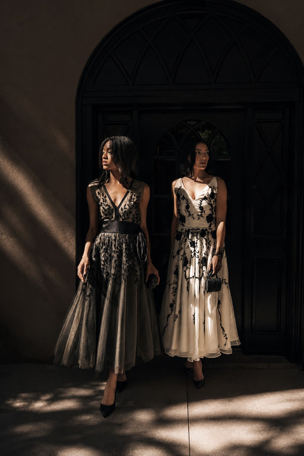 Two models wearing Sujata Gazder dresses